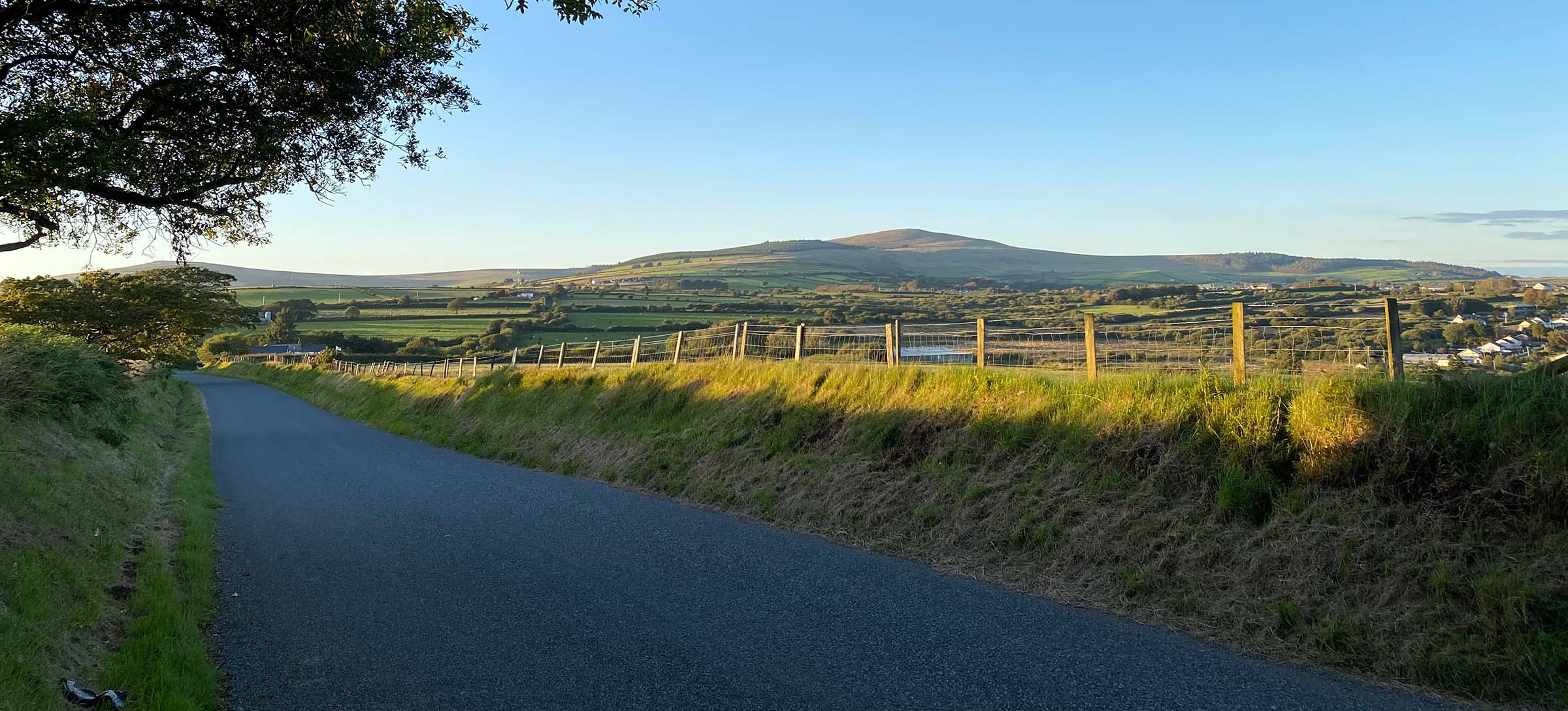 A view of the Preseli mountains with a road in the foreground