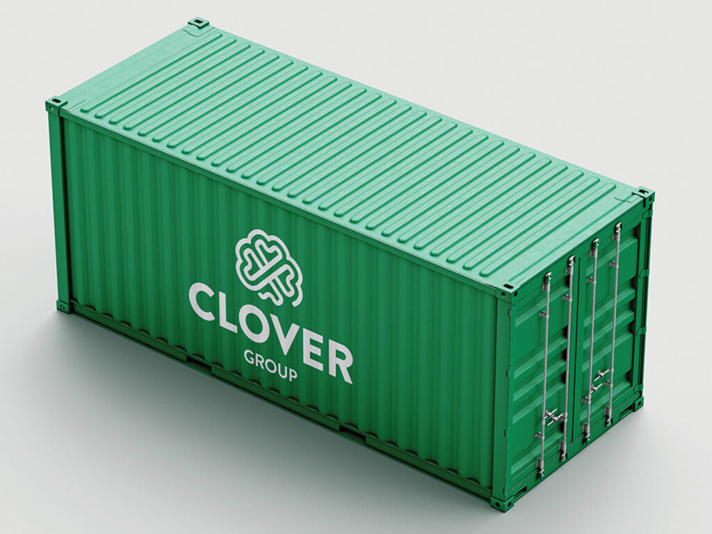 A green shipping container featuring the Clover Group logo