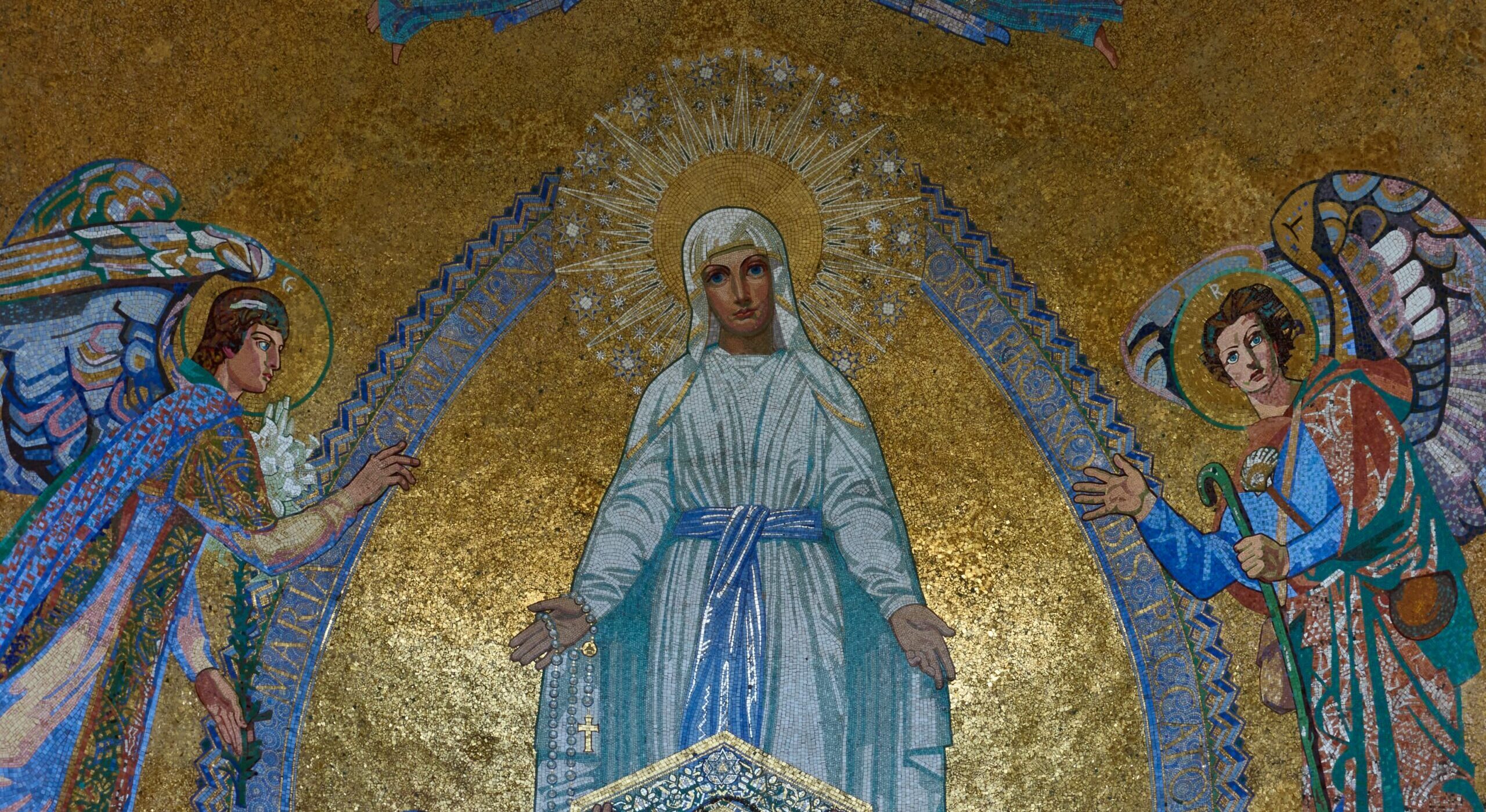 A religious mosaic from Lourdes in gold, white and blue