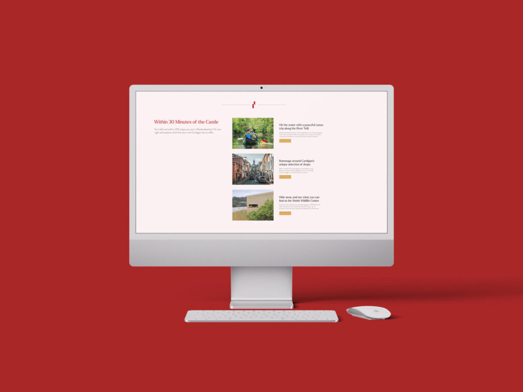 A red background with an imac showing the Pembrokeshire page from Cardigan Castle's website