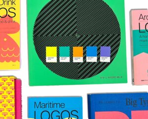 Pantone colour swatches laid out across design books